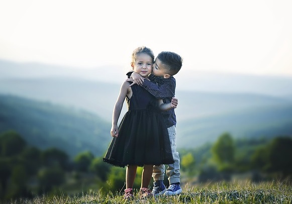 Siblings hugging